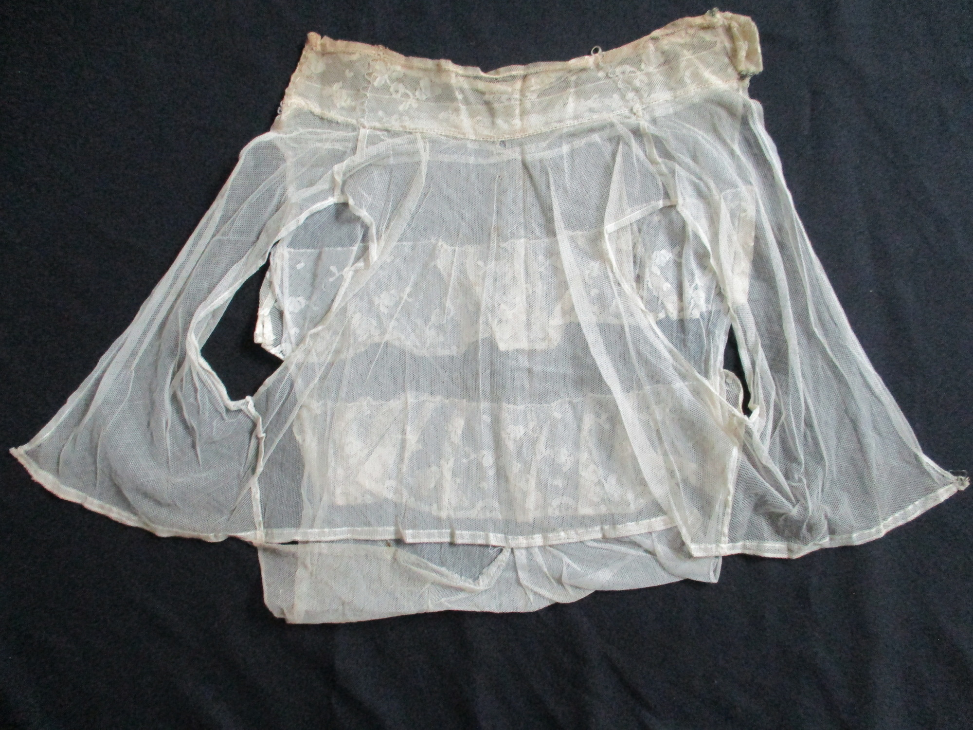 Bib and Collar: Reverse image of bib and collar.