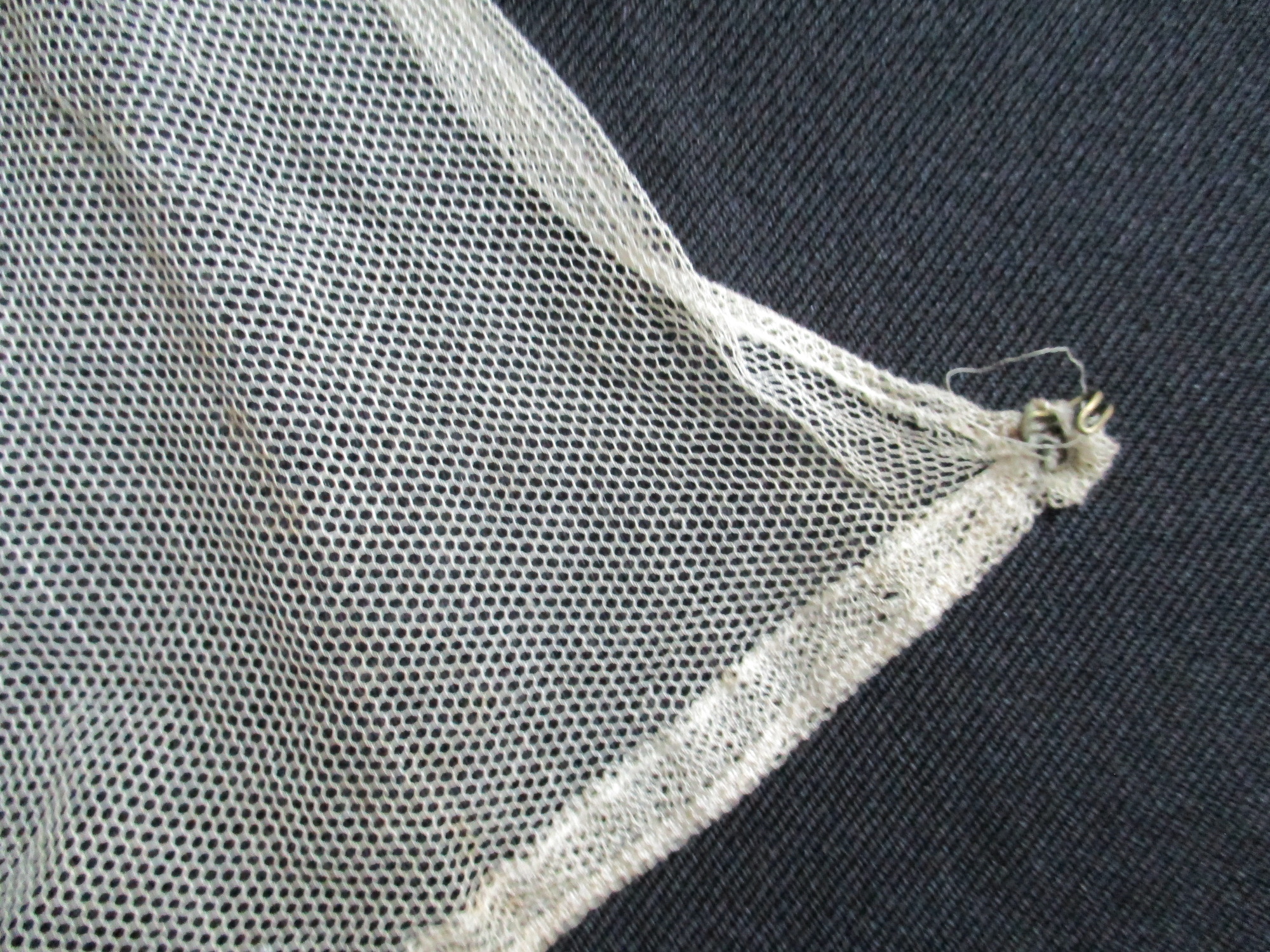 Bib and Collar: Hook located on lower right corner of bib.