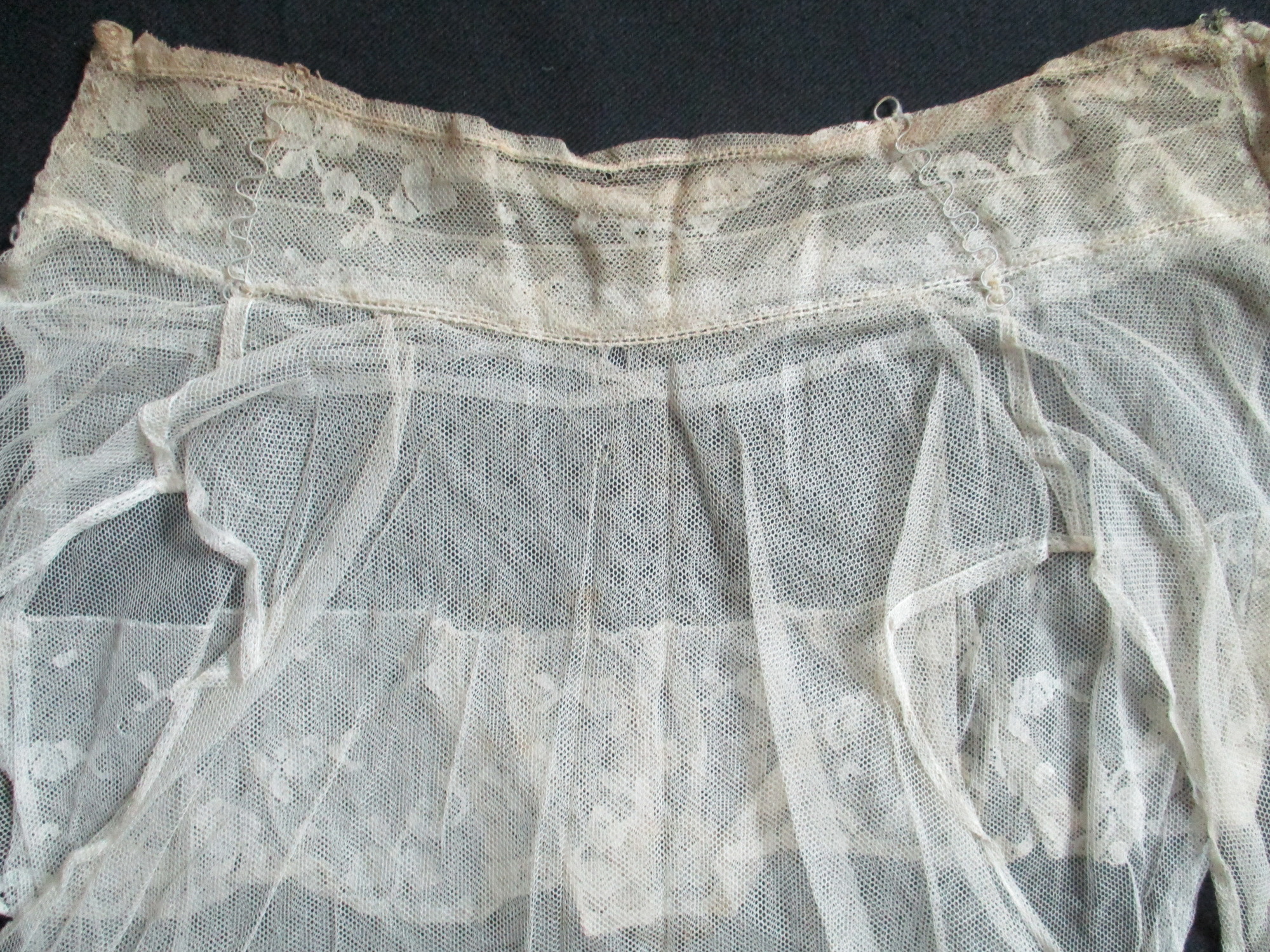 Bib and Collar: Reverse image of bib and collar.