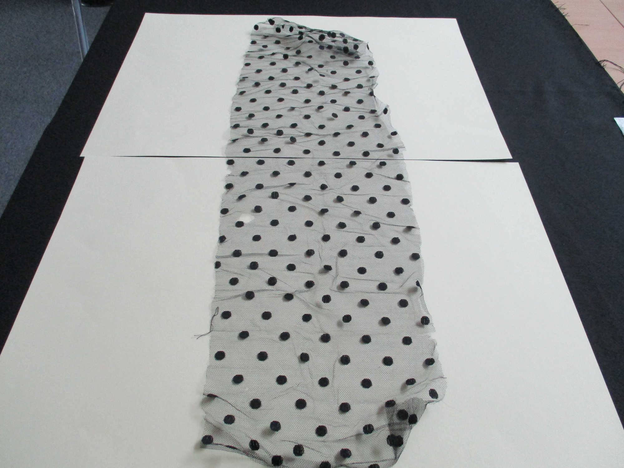 Black lace netting: Full length image of second piece of spotted black netting.