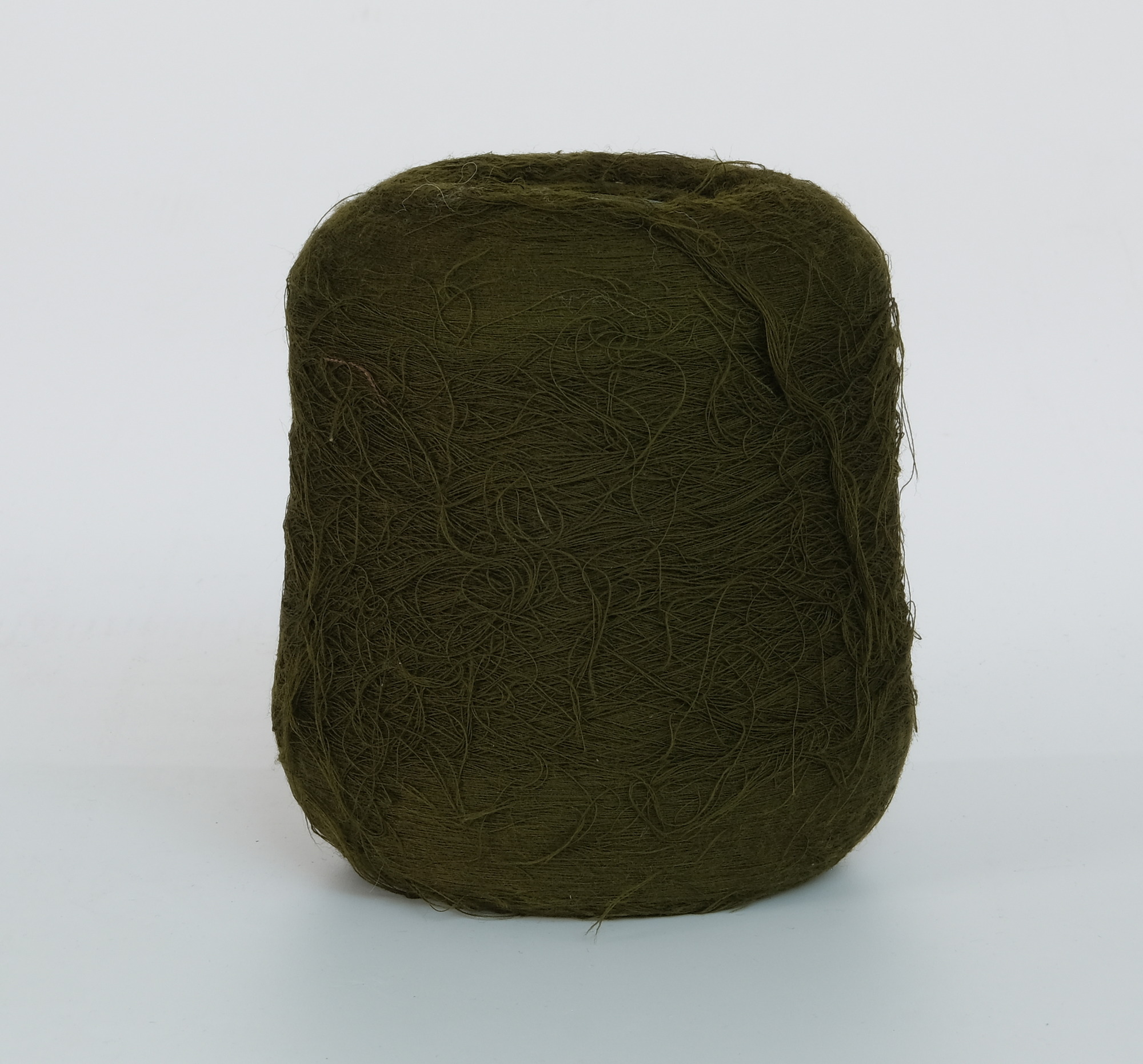 Bobbin of dark green yarn