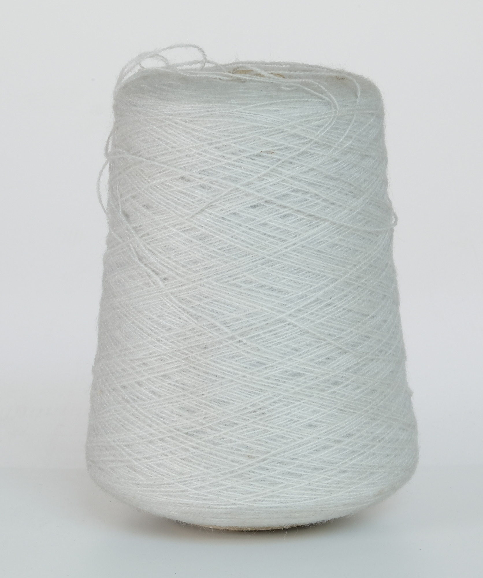 Bobbin of light grey yarn