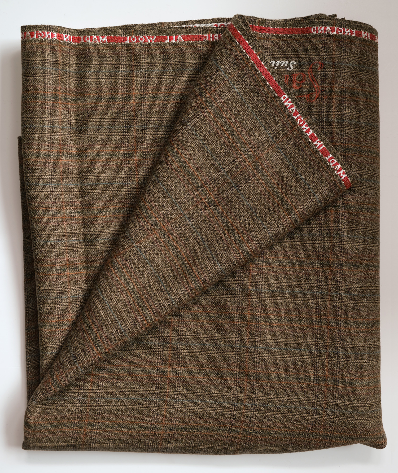 Length of light-checked all-wool cloth: View showing cloth folded back