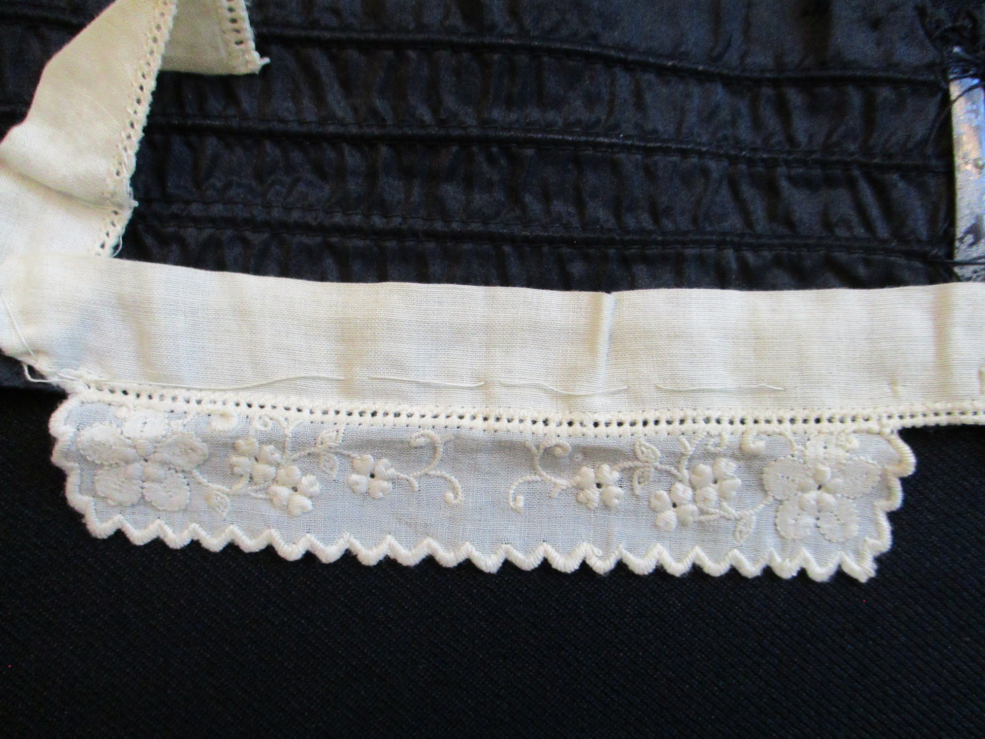 Mourning Collar and Sash: Embroidered detail on mourning collar.