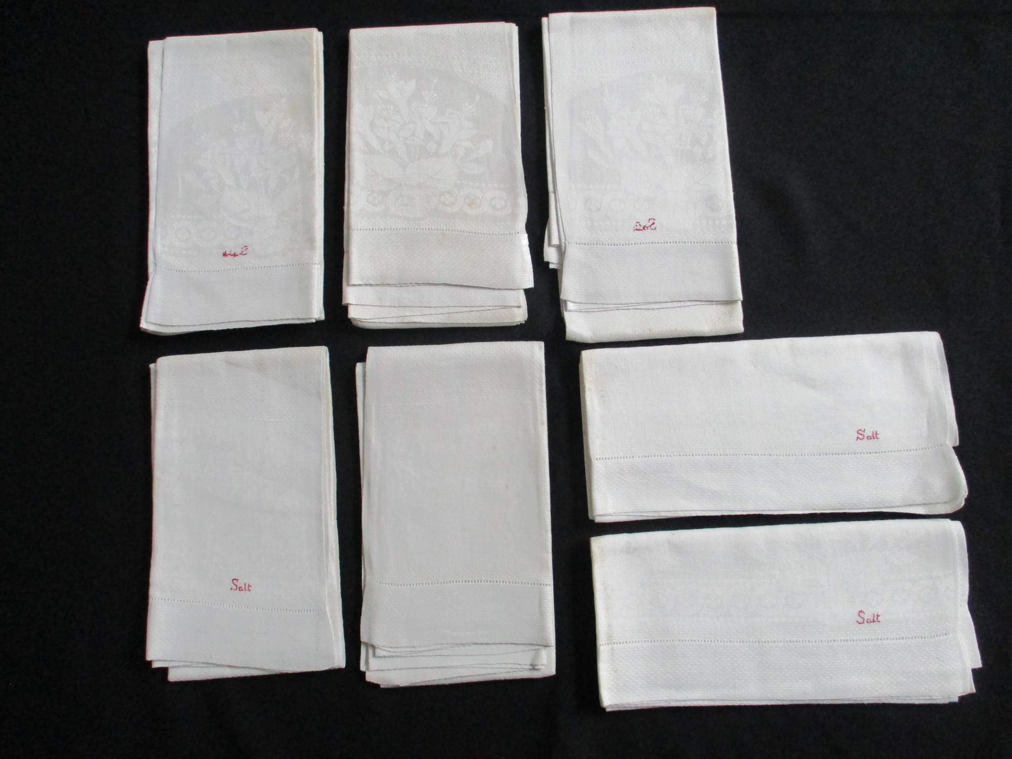 Seven cream damask towels.