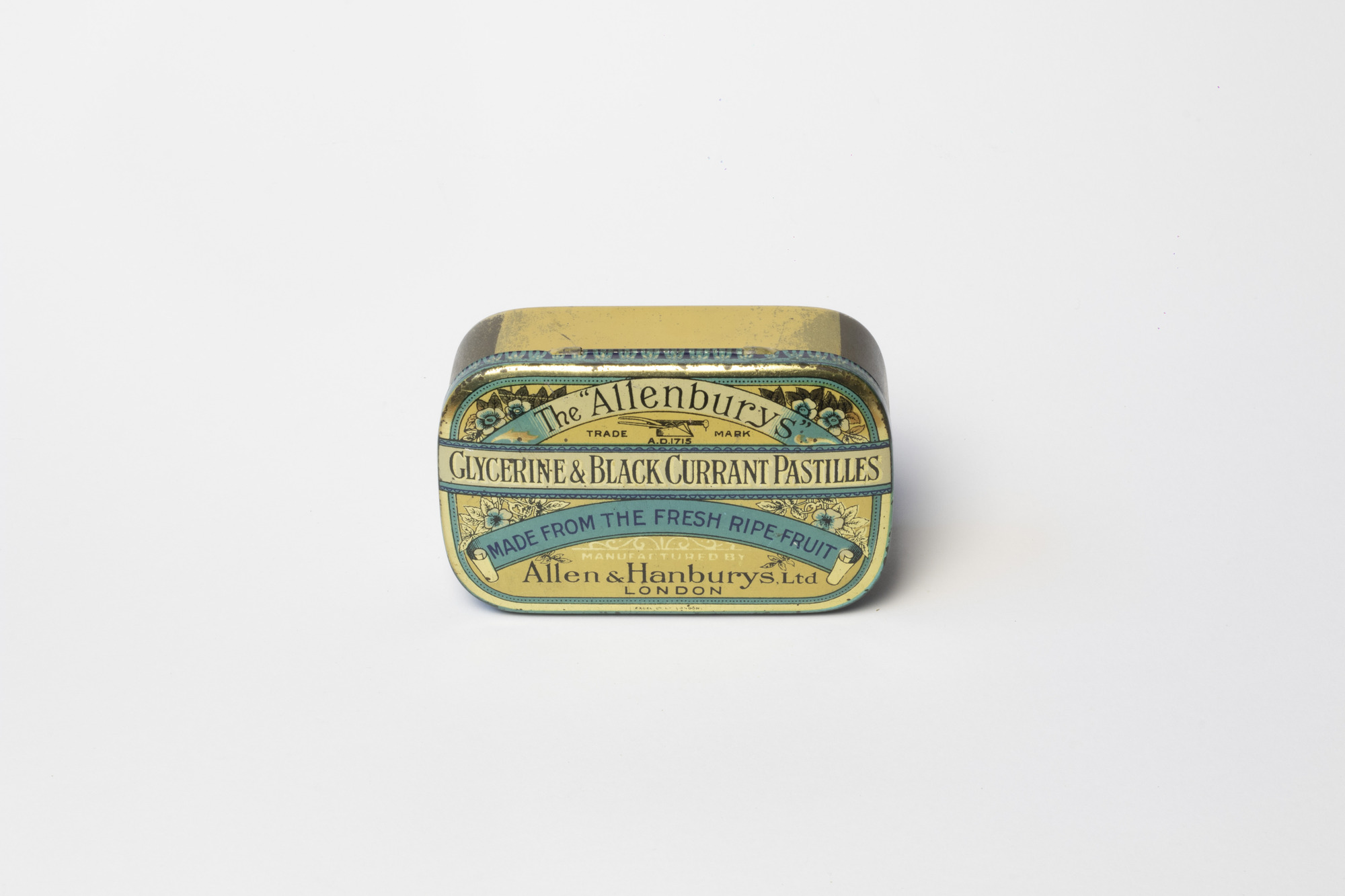 Tin box containing acorns: front view