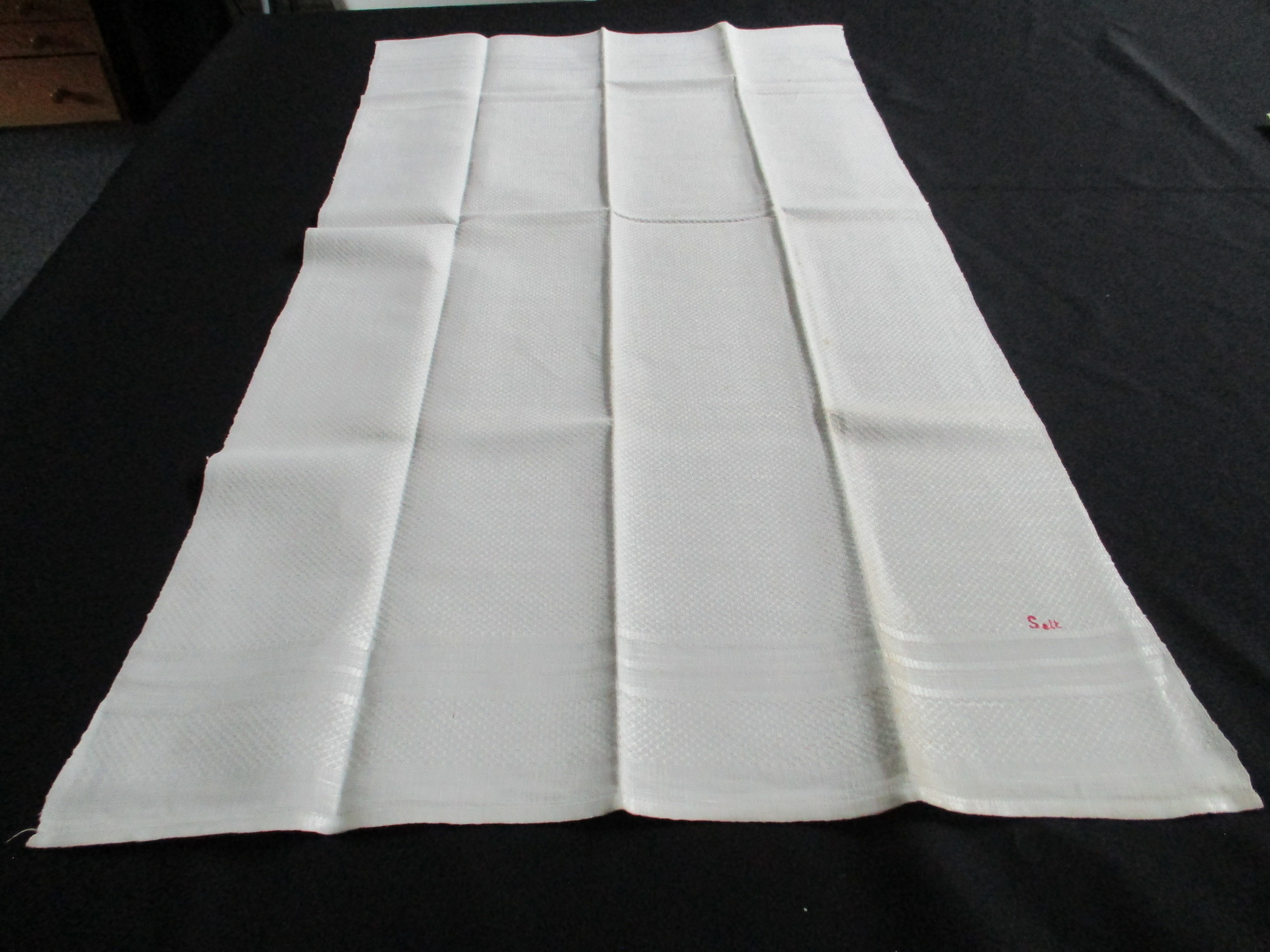 Two damask towels.: Close up of Salt monogram