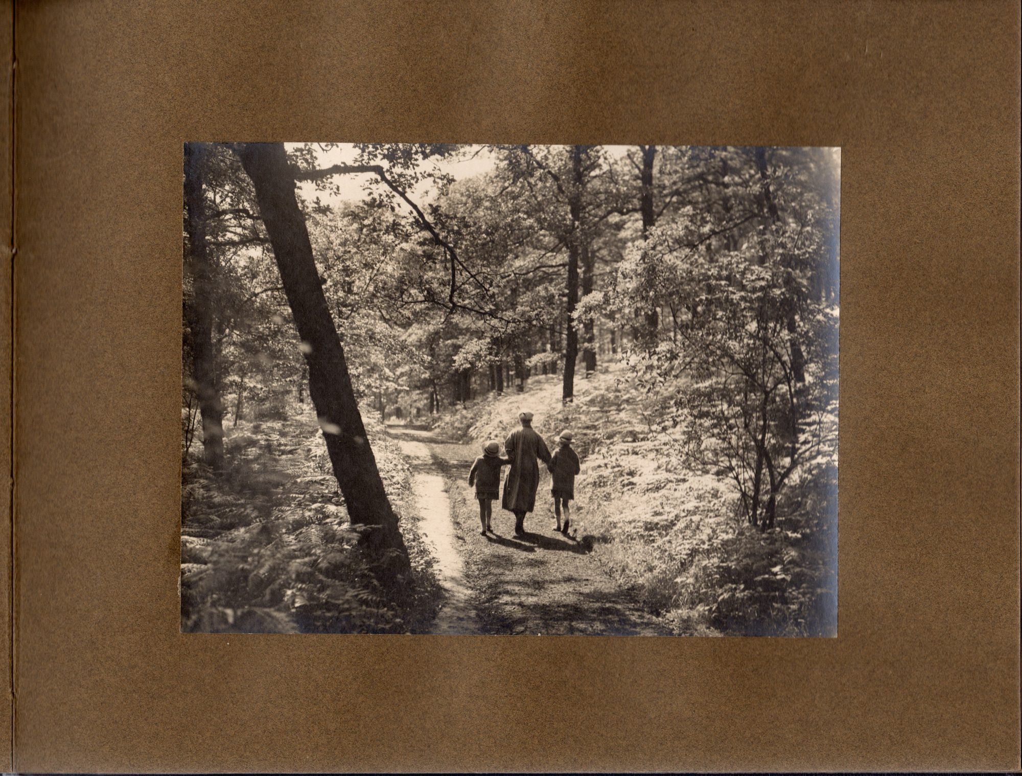 Northcliffe Woods 1920: Page 5 - Woman and 2 children wlaking through Northcliffe Woods