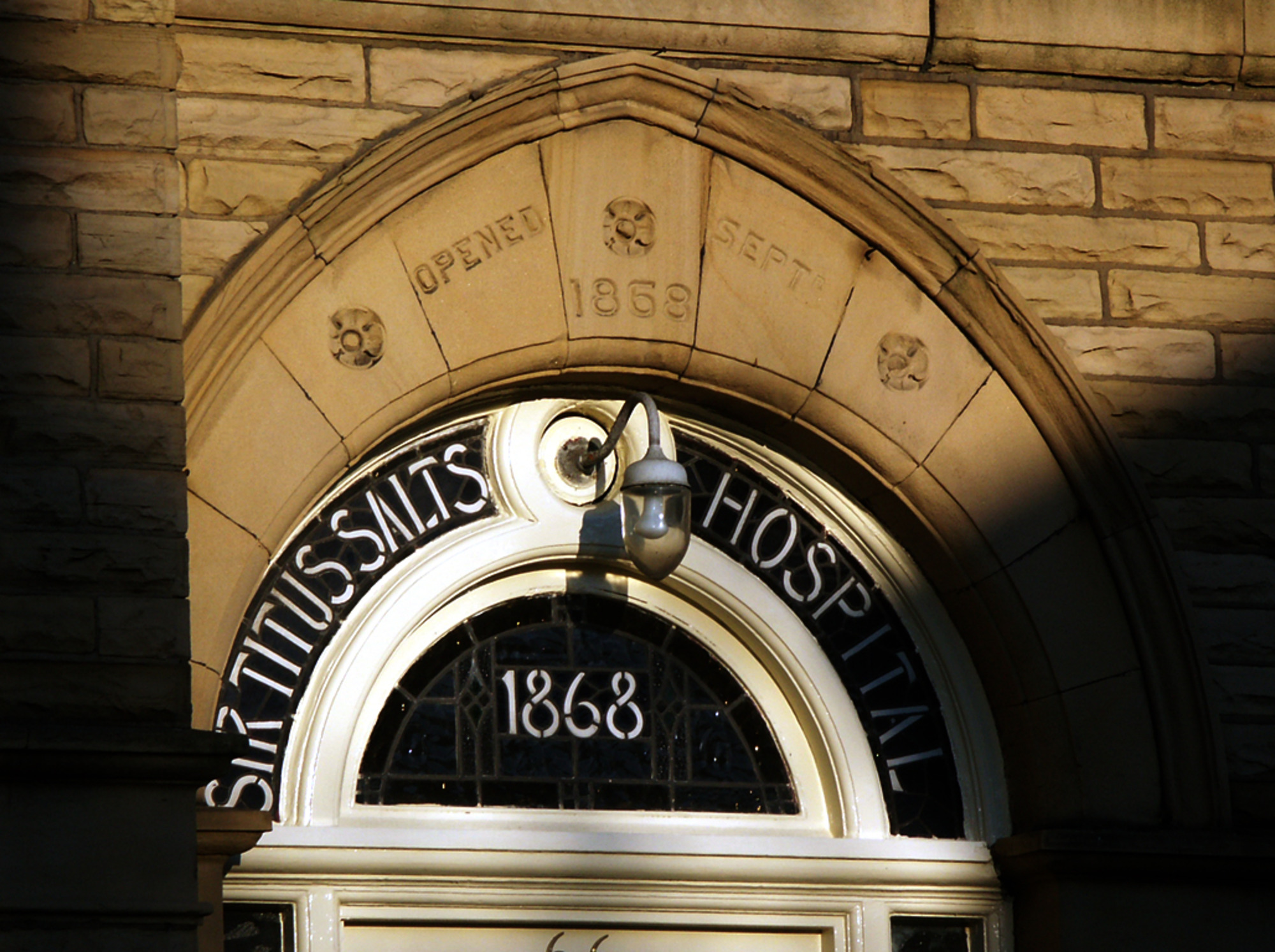 Salts Hospital front door window in lowlight