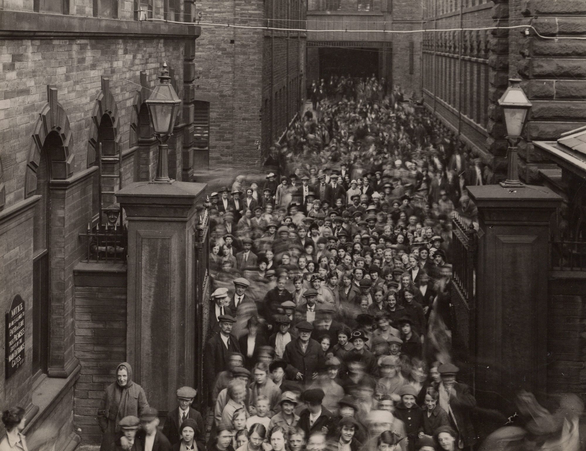 Workers leaving Salts Mill (c 1920s)